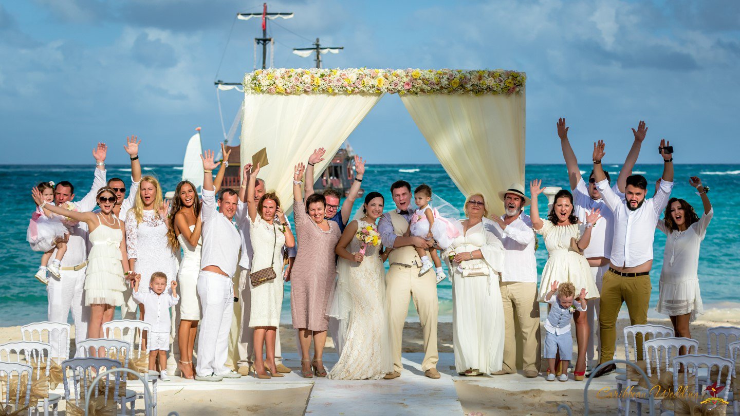 Group wedding photos at Huracan cafe restaurant, one of the most popular wedding venues in Punta Cana