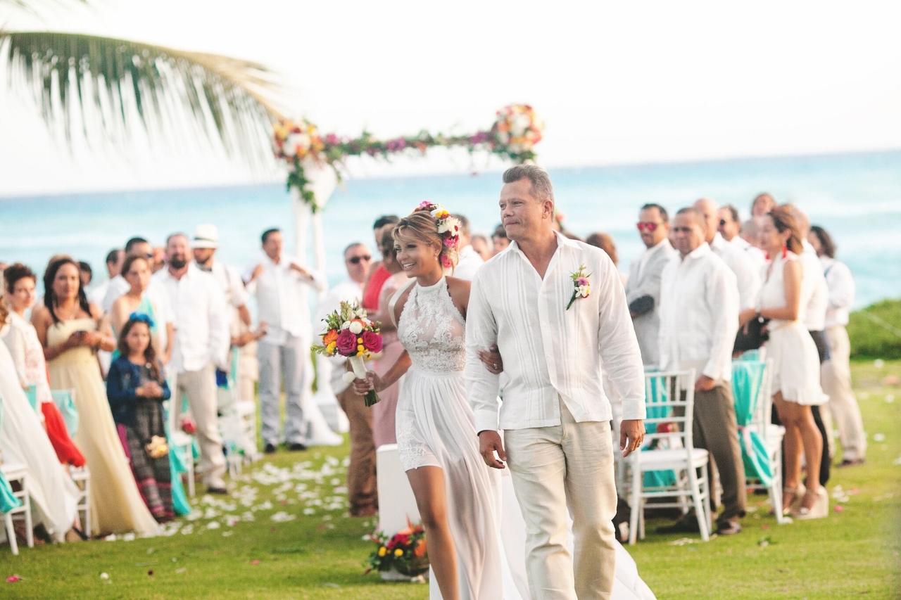 Couple's exit from the wedding at La Palapa Eden Roc, one of the most popular wedding venues in Punta Cana
